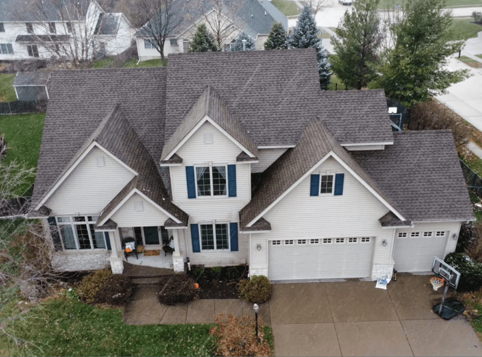 A home in the Quad Cities area with a new roof installed by New Summit Roofing