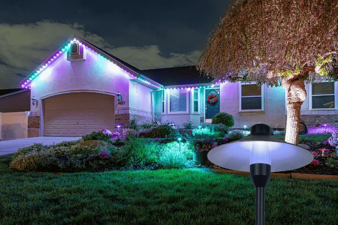A home with permanent LED roofline lighting installed by New Summit Roofing