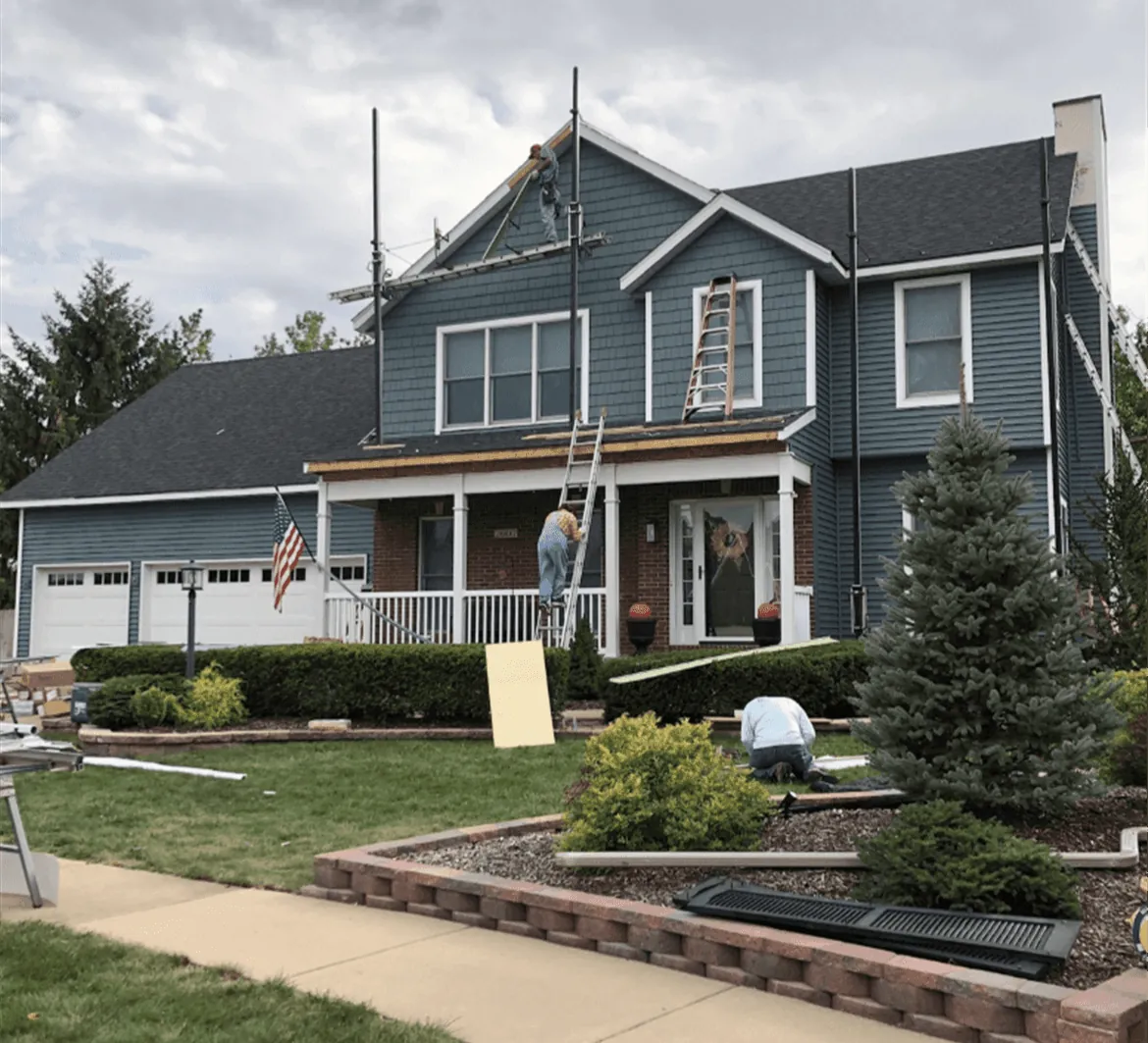 A finished two-story home with new roofing and siding