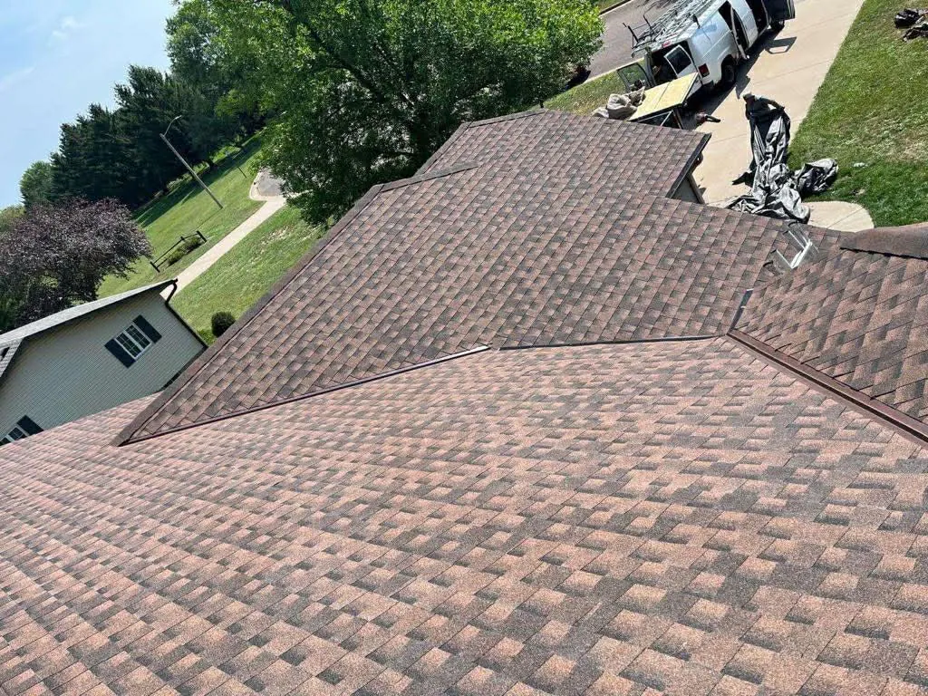 Aerial view of a large architectural-shingle roof by New Summit Roofing