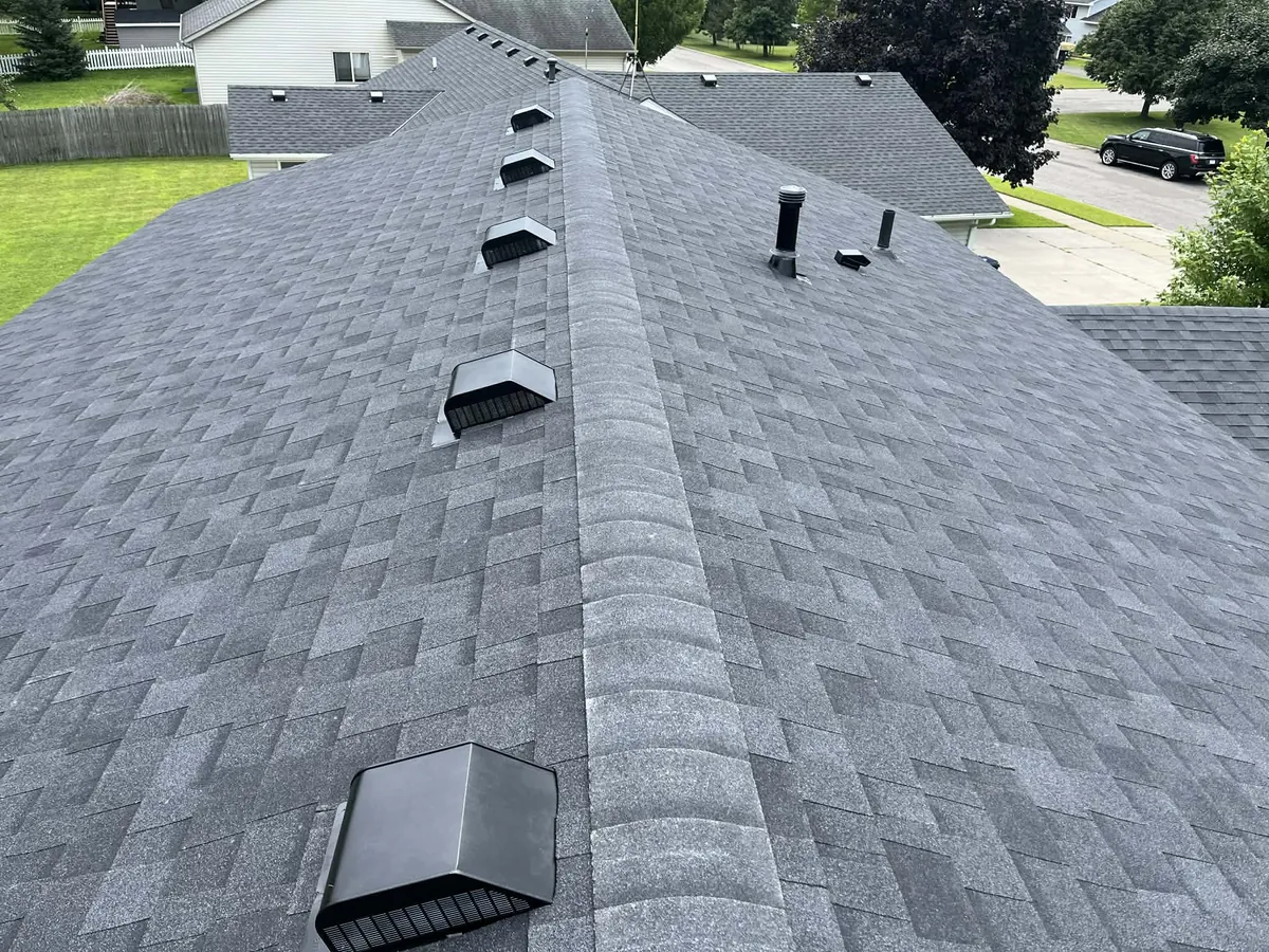 A freshly installed gray architectural-shingle roof