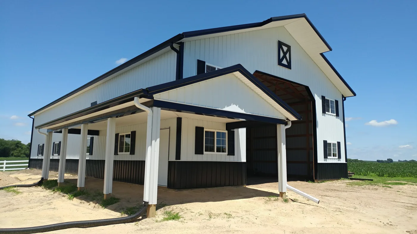 A modern farmhouse with new siding by New Summit Roofing